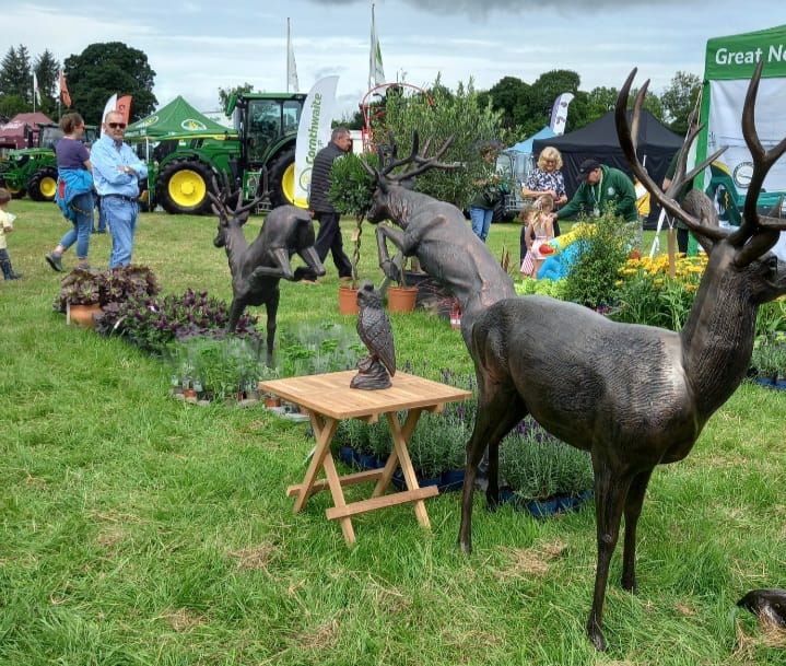 Garden display with deer statues at event